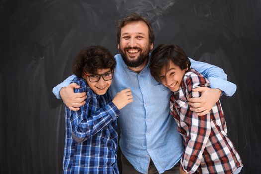 happy father hugging sons unforgettable moments of family joy in mixed race middle eastern Arab family. High quality photo