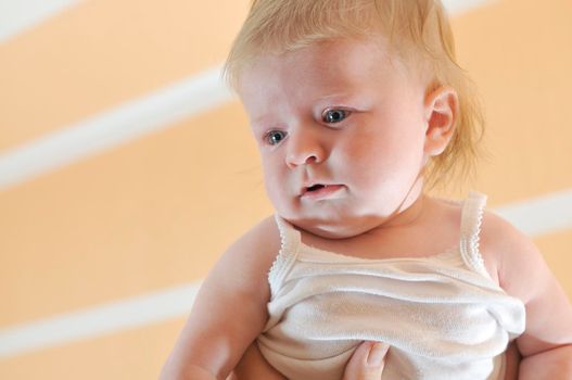 cute little baby indoor closeup portrait