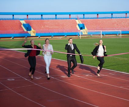 business people running together on  athletics racing track