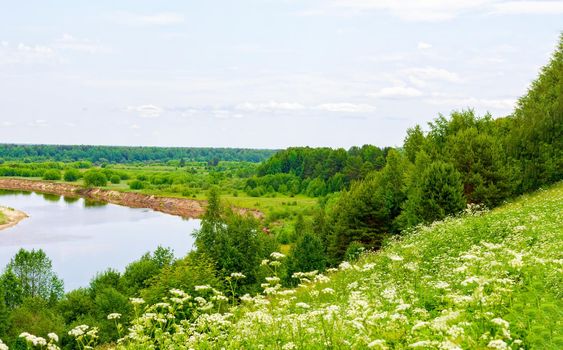 View of the traveler from the shore to the river in Vetluga. Kostroma region. Russia. The concept of tourism, Summer holidays with the whole family.