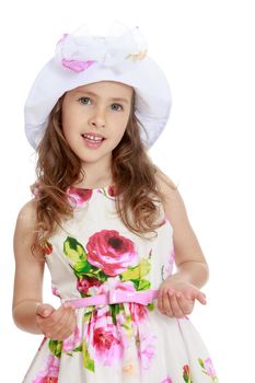 Adorable little girl in a white dress with roses and Panama. Close-up - Isolated on white background