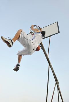 basketball player practicing and posing for basketball and sports athlete concept