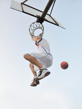 basketball player practicing and posing for basketball and sports athlete concept