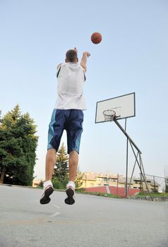 basketball player practicing and posing for basketball and sports athlete concept