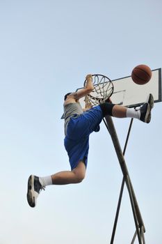 basketball player practicing and posing for basketball and sports athlete concept