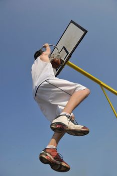 basketball player practicing and posing for basketball and sports athlete concept