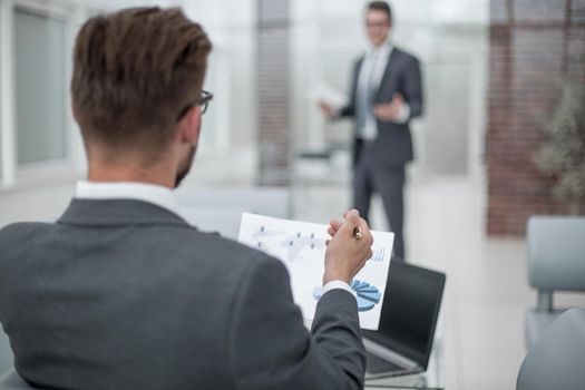 close up.businessman discussing financial report. photo with copy space