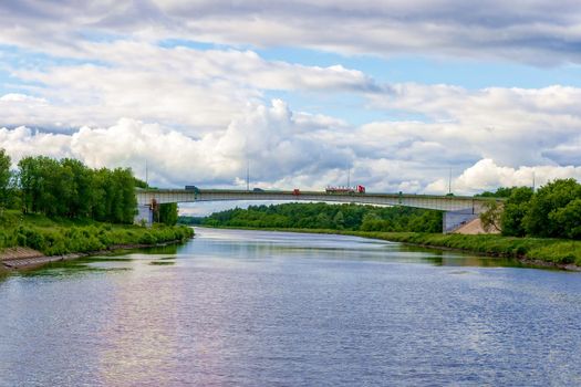 Channel named after Moscow, to a view of the beautiful bridge from the ship during a river cruise. Russia, Moscow region. The concept of family tourism.