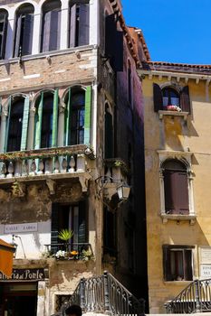 Old buildings in sun rays. Concept of town photos and european architectue.