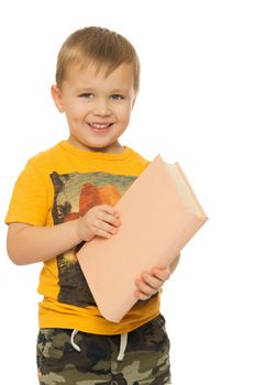 Cute little boy holding a book. Close-up - Isolated on white background