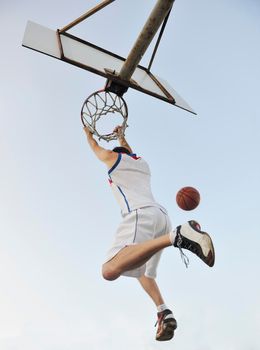 basketball player practicing and posing for basketball and sports athlete concept