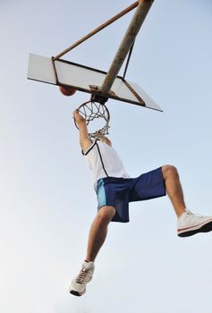 basketball player practicing and posing for basketball and sports athlete concept