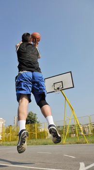 basketball player practicing and posing for basketball and sports athlete concept