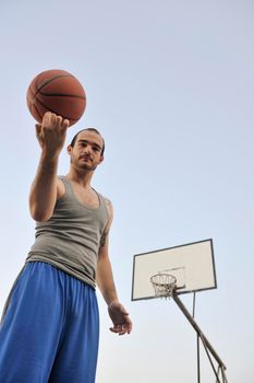 basketball player practicing and posing for basketball and sports athlete concept