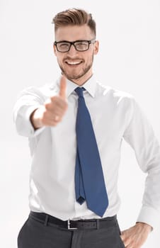 close up.successful businessman showing thumb up. success concept