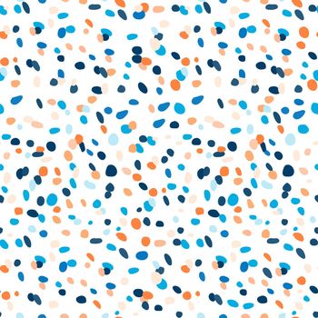 Modern festive seamless pattern on a white background. Blue and orange color. Confetti dots design for prints on fabric or packaging