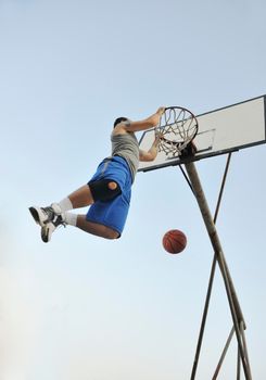 basketball player practicing and posing for basketball and sports athlete concept