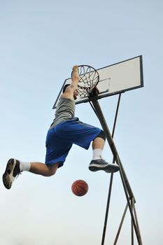 basketball player practicing and posing for basketball and sports athlete concept