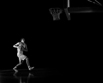 basketball game sport player in action isolated on black background