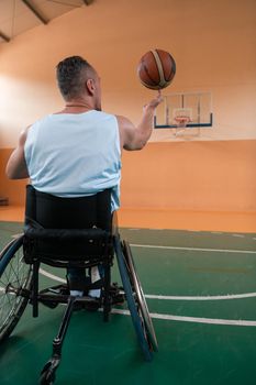 a photo of a war veteran playing basketball in a modern sports arena. The concept of sport for people with disabilities. High quality photo