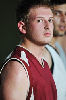 basket ball players team portrait in hi-school sport gymbasket ball players team portrait in hi-school sport gym