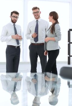 business team talking in an empty office.photo with text space