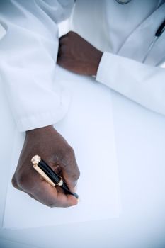 close up. scientist writing data into a lab journal.photo with copy space