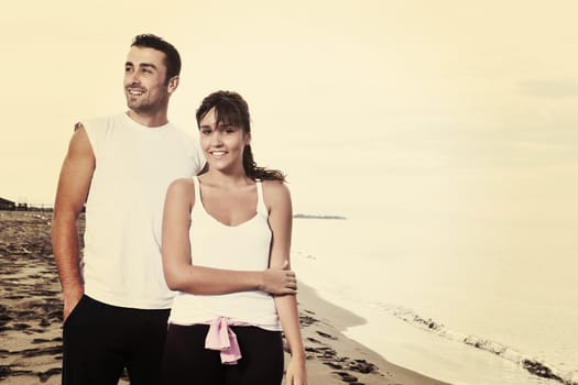 happy young couple in white clothing  have romantic recreation and   fun at beautiful beach on  vacations