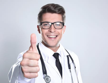 portrait of a doctor with a clipboard pointing isolated on white background