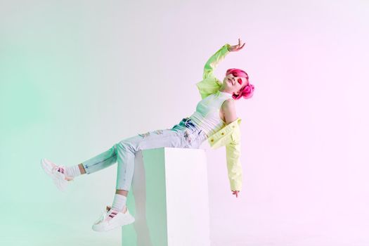 woman with pink hair teen fashionable clothes posing neon. High quality photo