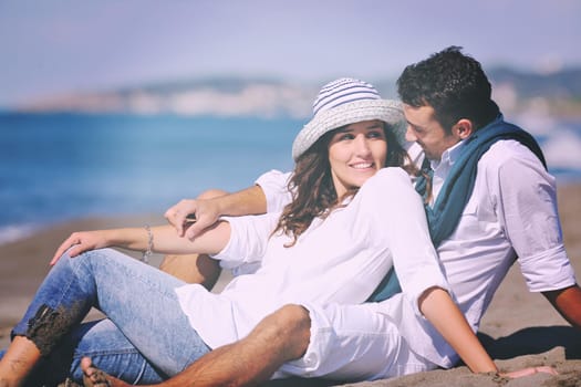 happy young couple in white clothing  have romantic recreation and   fun at beautiful beach on  vacations