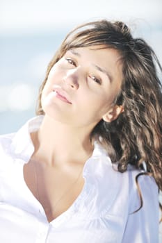 happy young woman relax onbeautiful  beach at morning