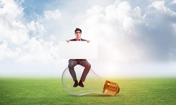 businessman with an empty banner. concept of creativity in business