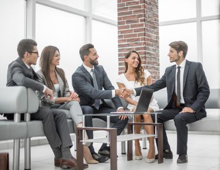 handshake of business people at a meeting in the business center.concept of partnership