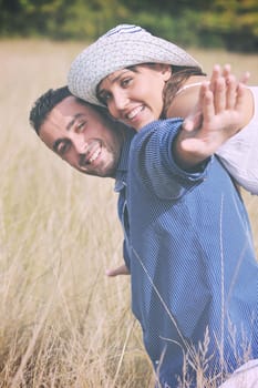 happy young couple have romantic time outdoor while smiling and hug