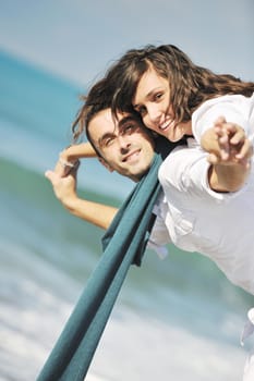 happy young couple in white clothing  have romantic recreation and   fun at beautiful beach on  vacations