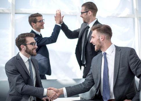 handshake business partners.the concept of a successful transaction