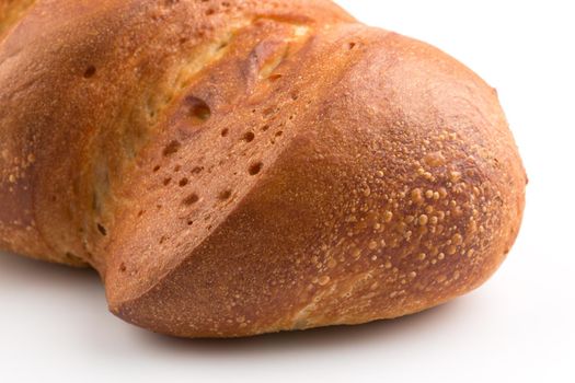 Fresh baked traditional bread on a white background