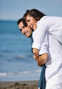 happy young couple in white clothing  have romantic recreation and   fun at beautiful beach on  vacations