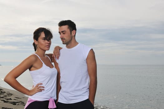 happy young couple in white clothing  have romantic recreation and   fun at beautiful beach on  vacations