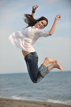 happy young couple have fun and romantic moments on beach at summer season and representing happynes and travel concept