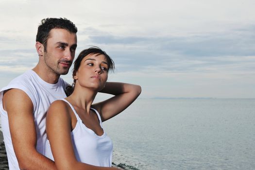 happy young couple in white clothing  have romantic recreation and   fun at beautiful beach on  vacations