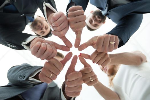 close up.business team showing their unity.the concept of teamwork