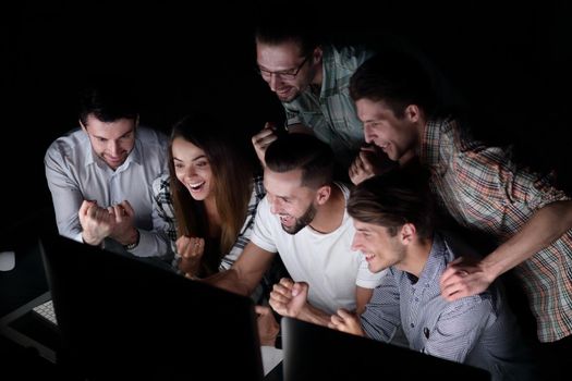 successful business team in the workplace at night.photo with copy space