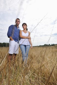 happy young couple have romantic time outdoor while smiling and hug