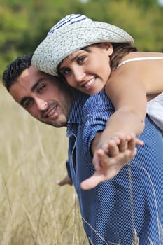 happy young couple have romantic time outdoor while smiling and hug