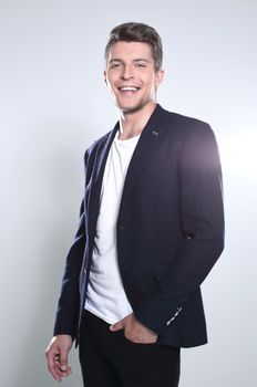 portrait of a confident man. isolated on gray background