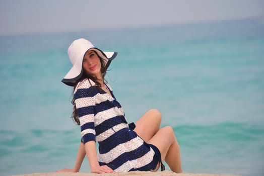 beautifel and happy woman girl on beach have fun and relax on summer vacation  over the beautiful tropical sea