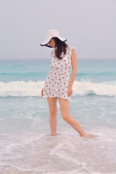 Happy Beautiful Woman Enjoying Summer Vacation on beach