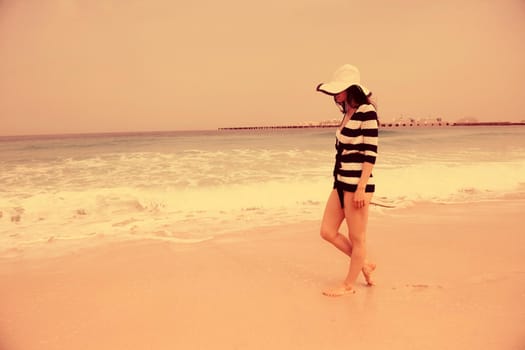 Happy Beautiful Woman Enjoying Summer Vacation on beach